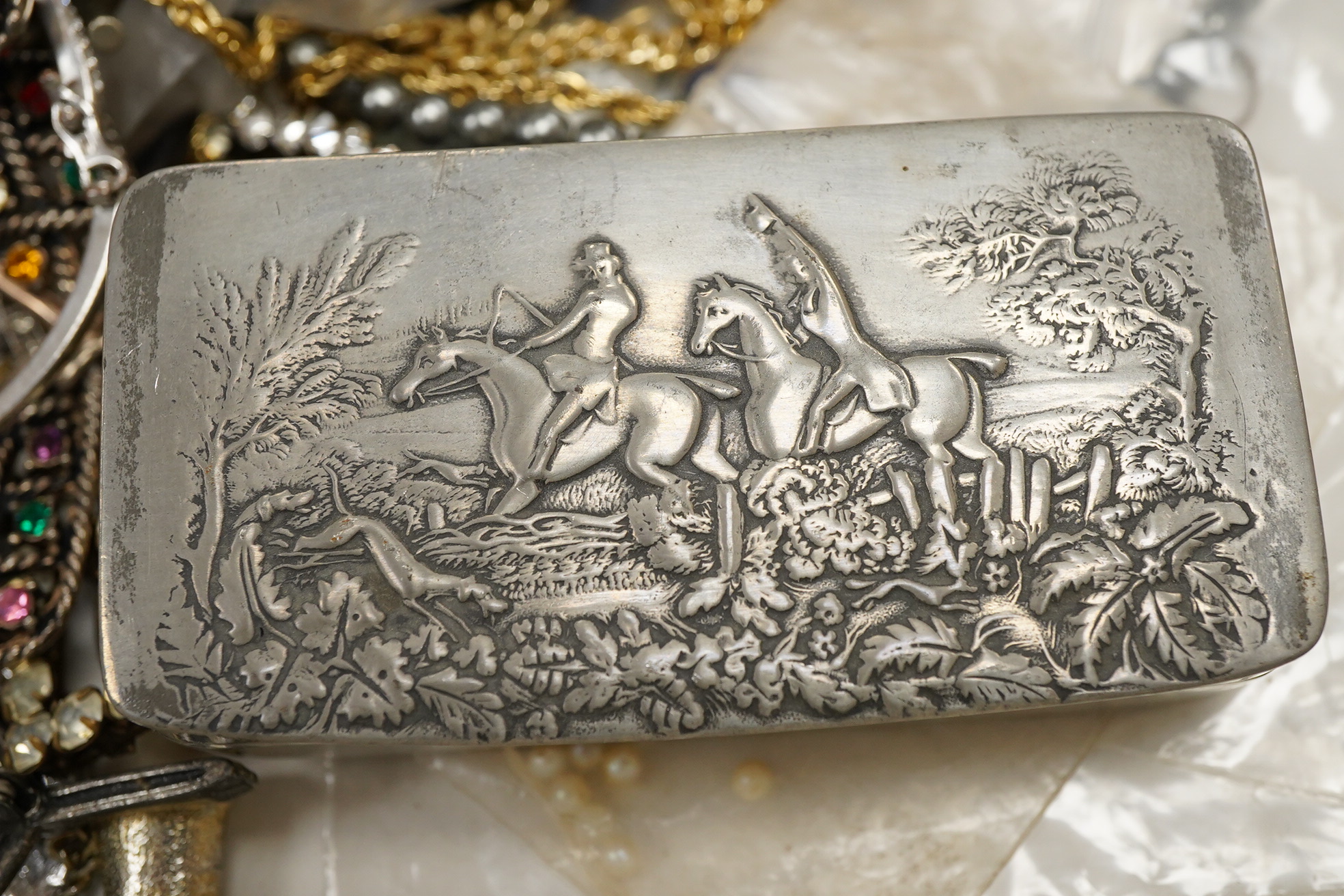 A group of assorted mainly costume jewellery, including bangles, ring, necklaces etc. together with a Cornish Pewter snuff box.